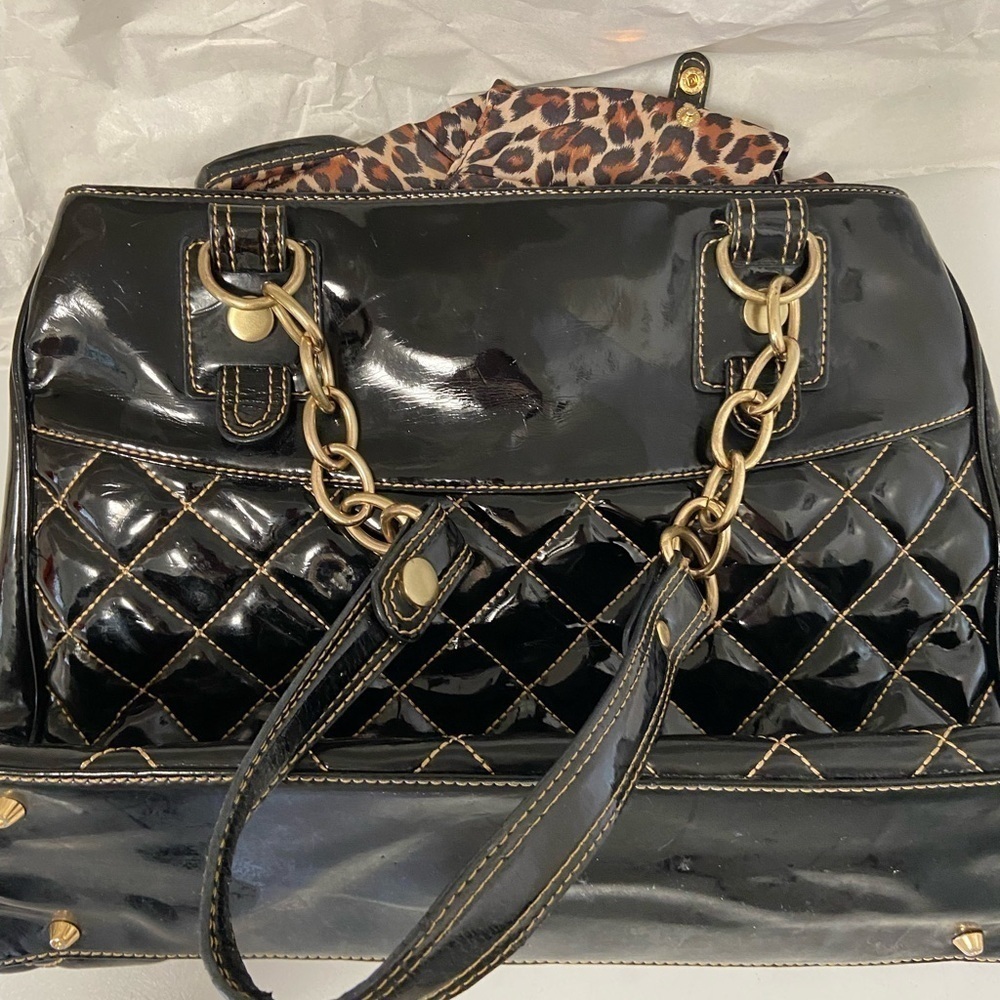 Maxx New York black patent quilted purse w gold chains on handles cheetah lining